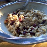 bowl of oatmeal with craisins and walnuts